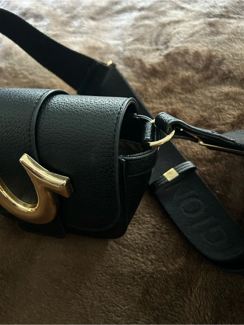 True Religion Black Crossbody Bag with Gold Horseshoe Accent
